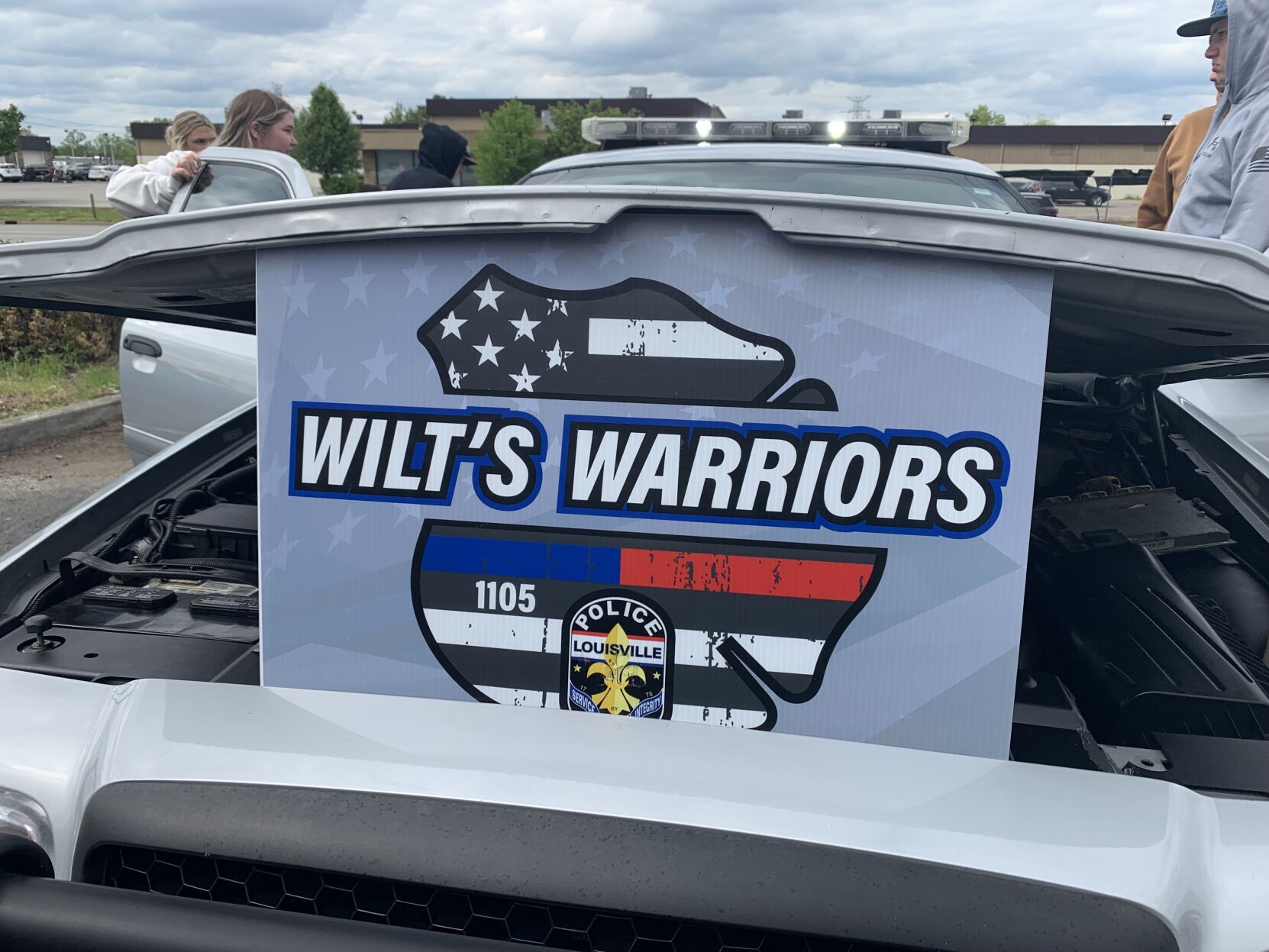 More than $11,000 raised at Louisville car show for LMPD officer injured in mass shooting
